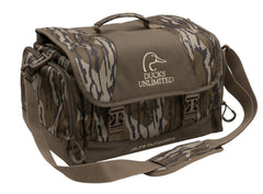 ALPS OutdoorZ Ducks Unlimited Floating Blind Bag in Mossy Oak Original Bottomland with waterproof protection for gear.