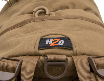 ALPS OutdoorZ Pursuit Pack blaze orange rain cover protects gear in wet conditions.