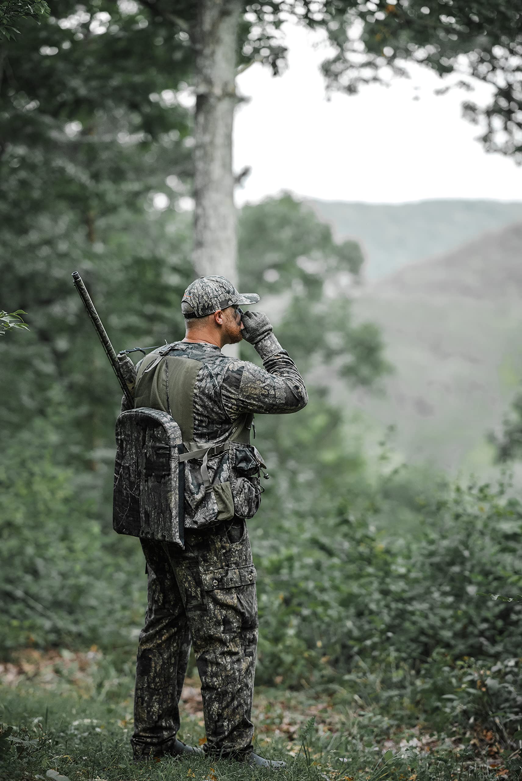 ALPS OutdoorZ Realtree Timber camouflage with breathable mesh panels for concealment and comfort.