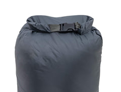 ALPS Mountaineering Dry Sack 45L blue gray during compression demonstrates air permeable bottom for venting air