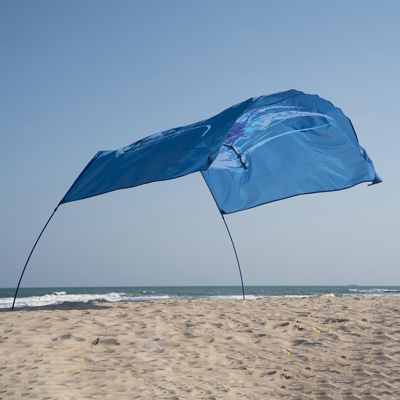ALYCASO digital ocean prints highlight vibrant artistry on sunshade fabric.