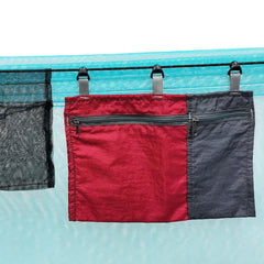 Amagogo hammock organizer's slidable design allows quick access to essentials.