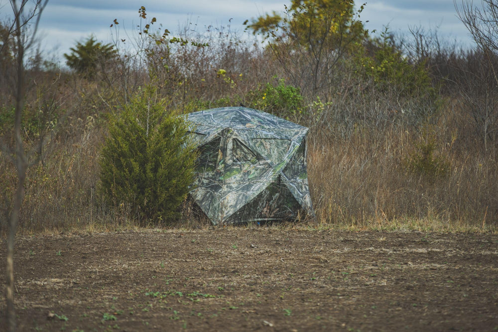 Ameristep Care Taker Magnum 9 camo mesh windows provide concealment while letting you monitor surroundings.