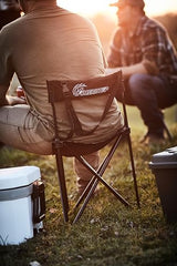 Ameristep tripod hunting chair in Mossy Oak blends with woods for discreet waits.