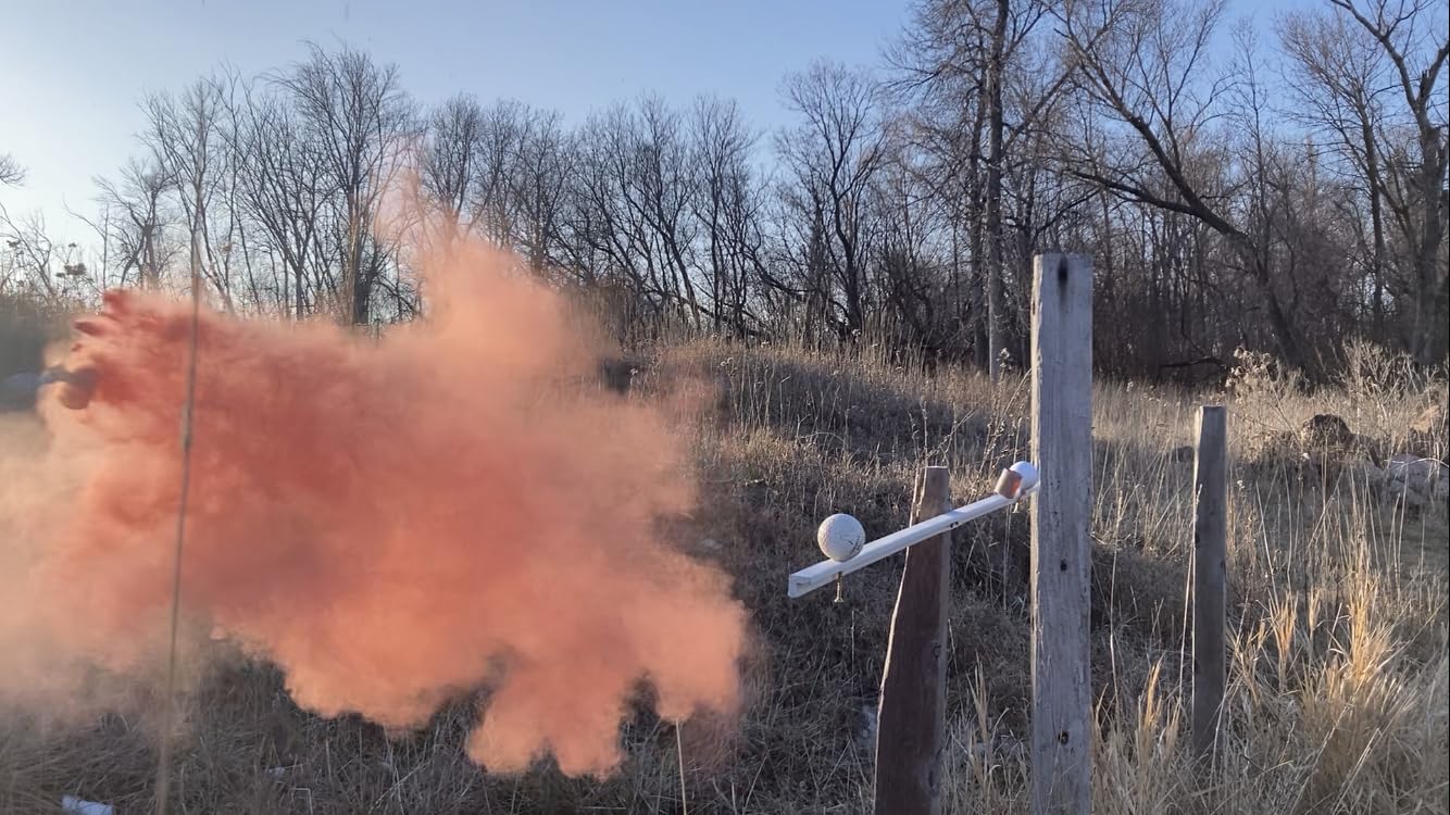 Ames Targets BlastCloud long-range plinking setup on an open practice range.