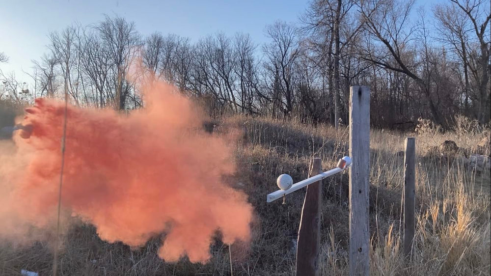 Ames Targets BlastCloud long-range plinking setup on an open practice range.