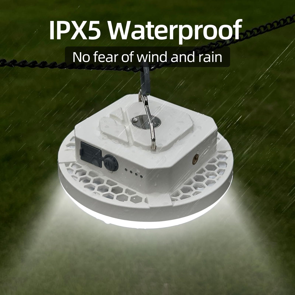 Amkulop IPX5 waterproof lantern shining in rainy outdoor conditions