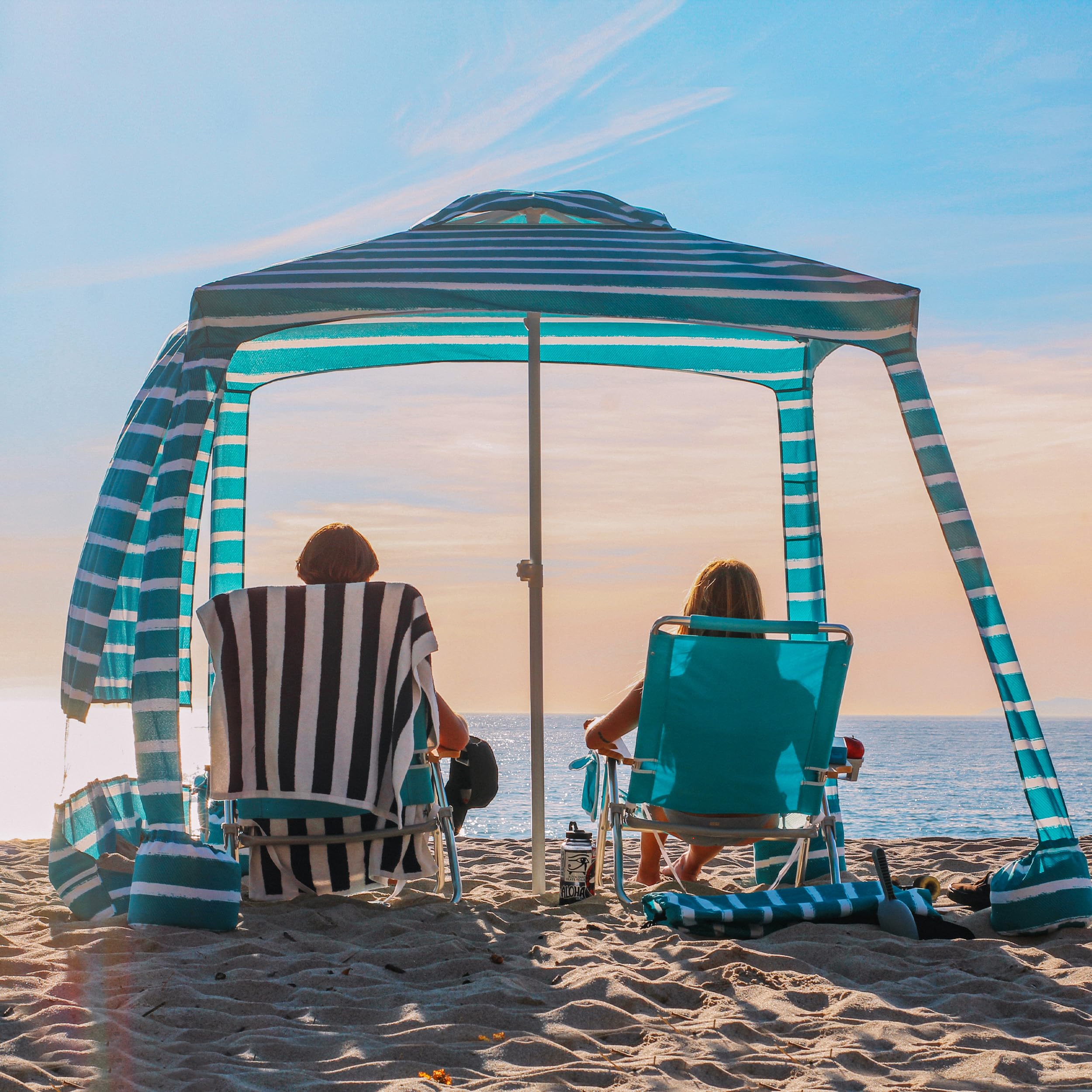 AMMSUN Beach Cabana setup in sand demonstrates quick setup and portable design.