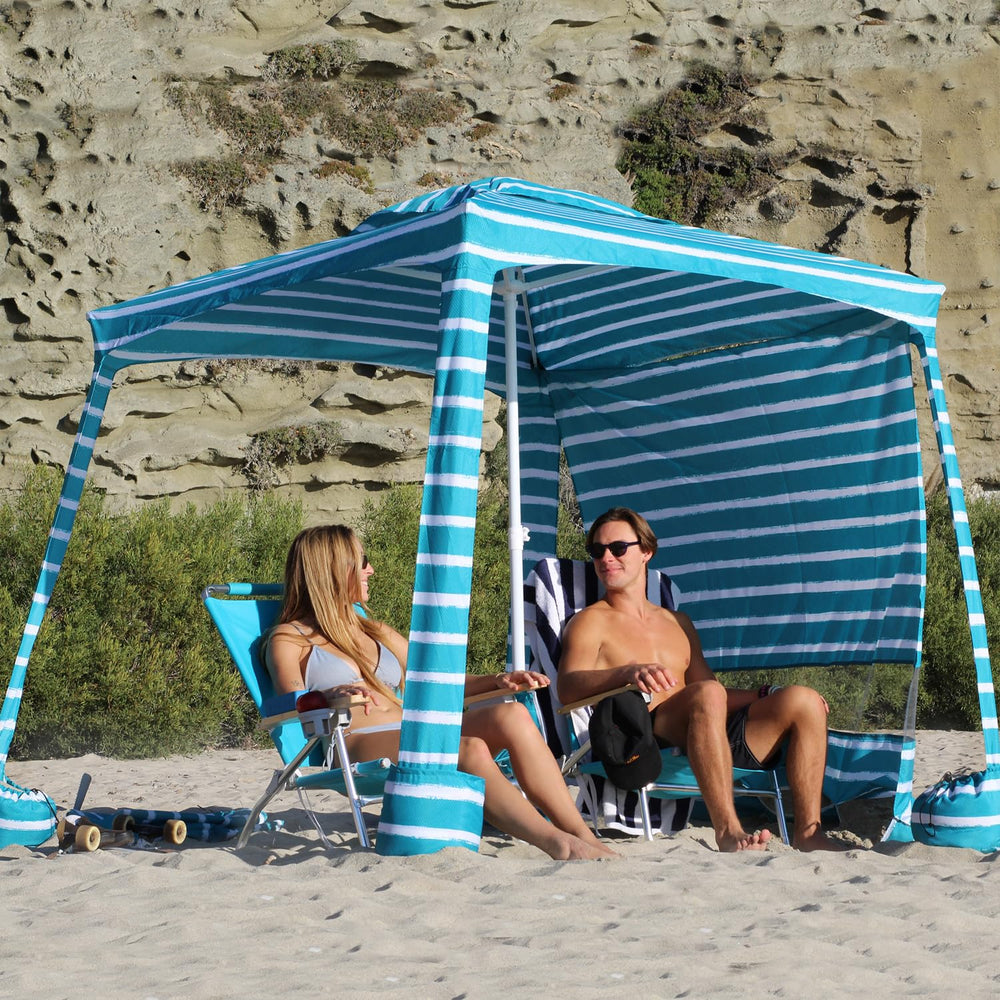 AMMSUN Beach Cabana setup in sand demonstrates quick setup and portable design.