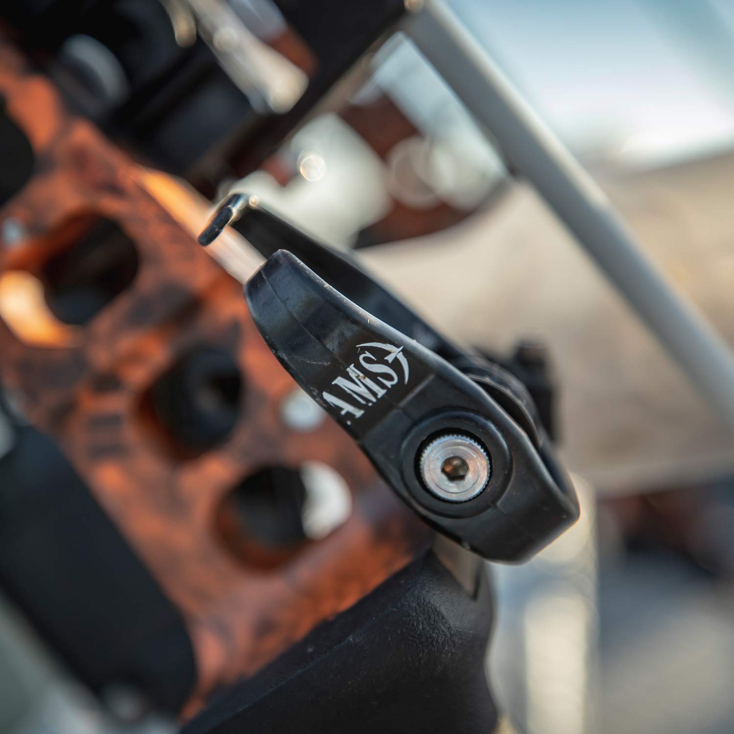 AMS Bowfishing Tidal Wave Arrow Rest side entry shows quick, side-load capability.