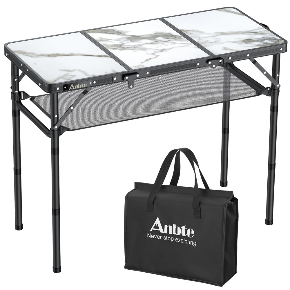 Anbte folding camping table with extended legs showing a sturdy aluminum frame for outdoor use.