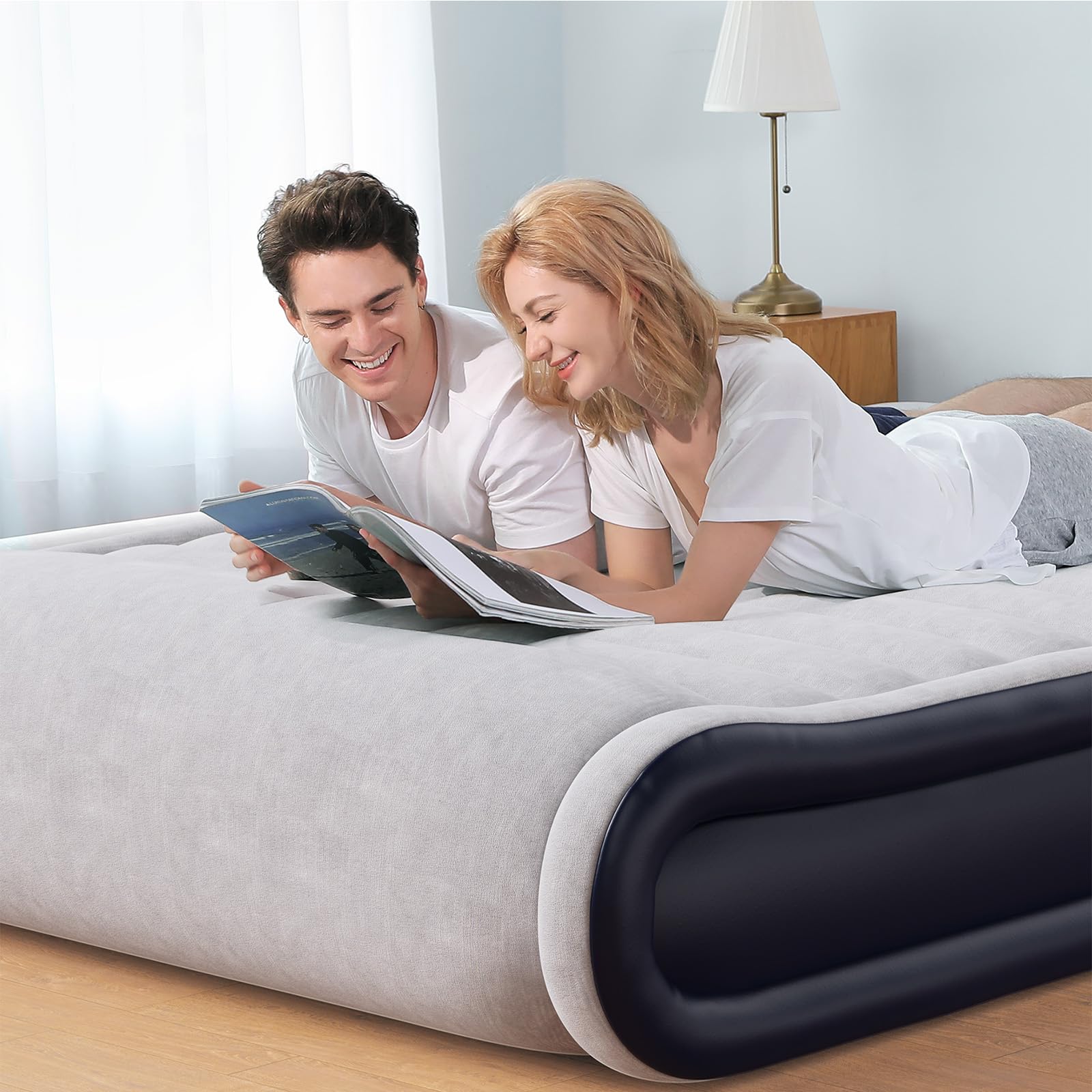 Andola Air Mattress Queen with raised pillow for neck support.
