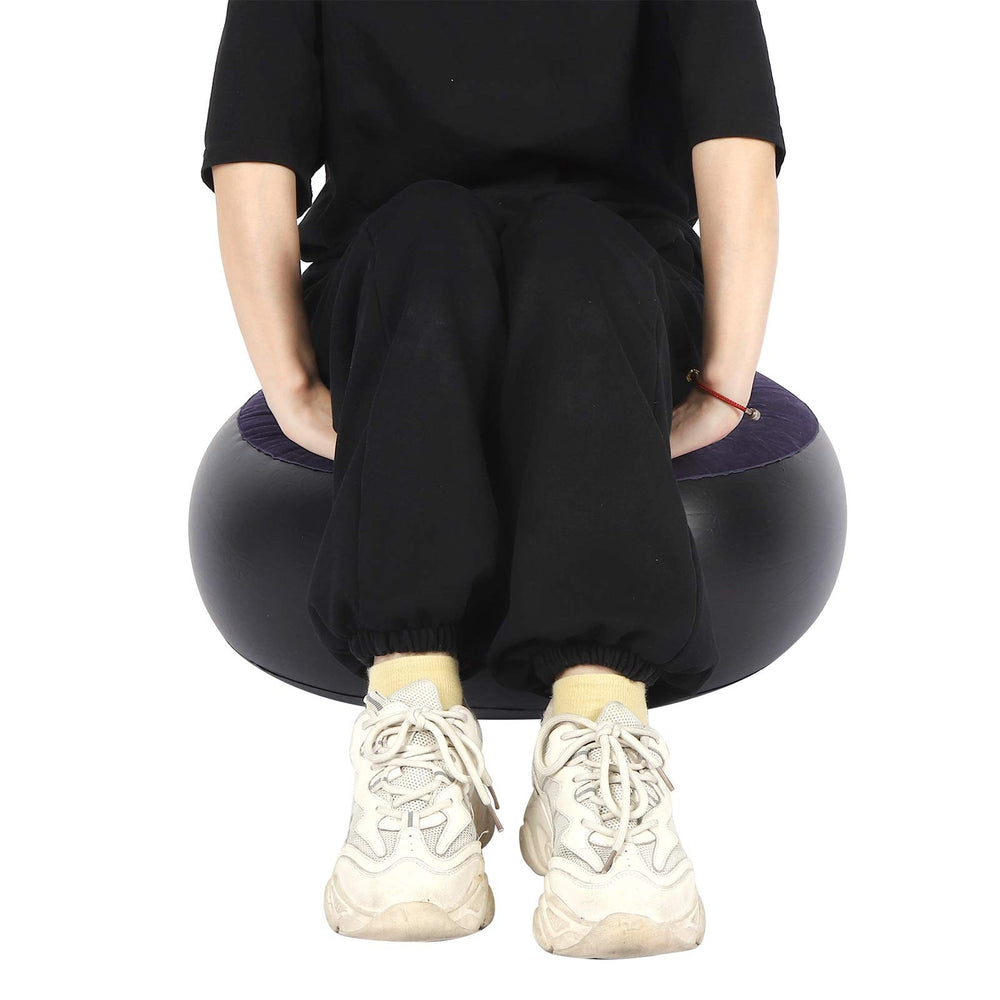 Anggrek inflatable ottoman used for yoga support on the go.