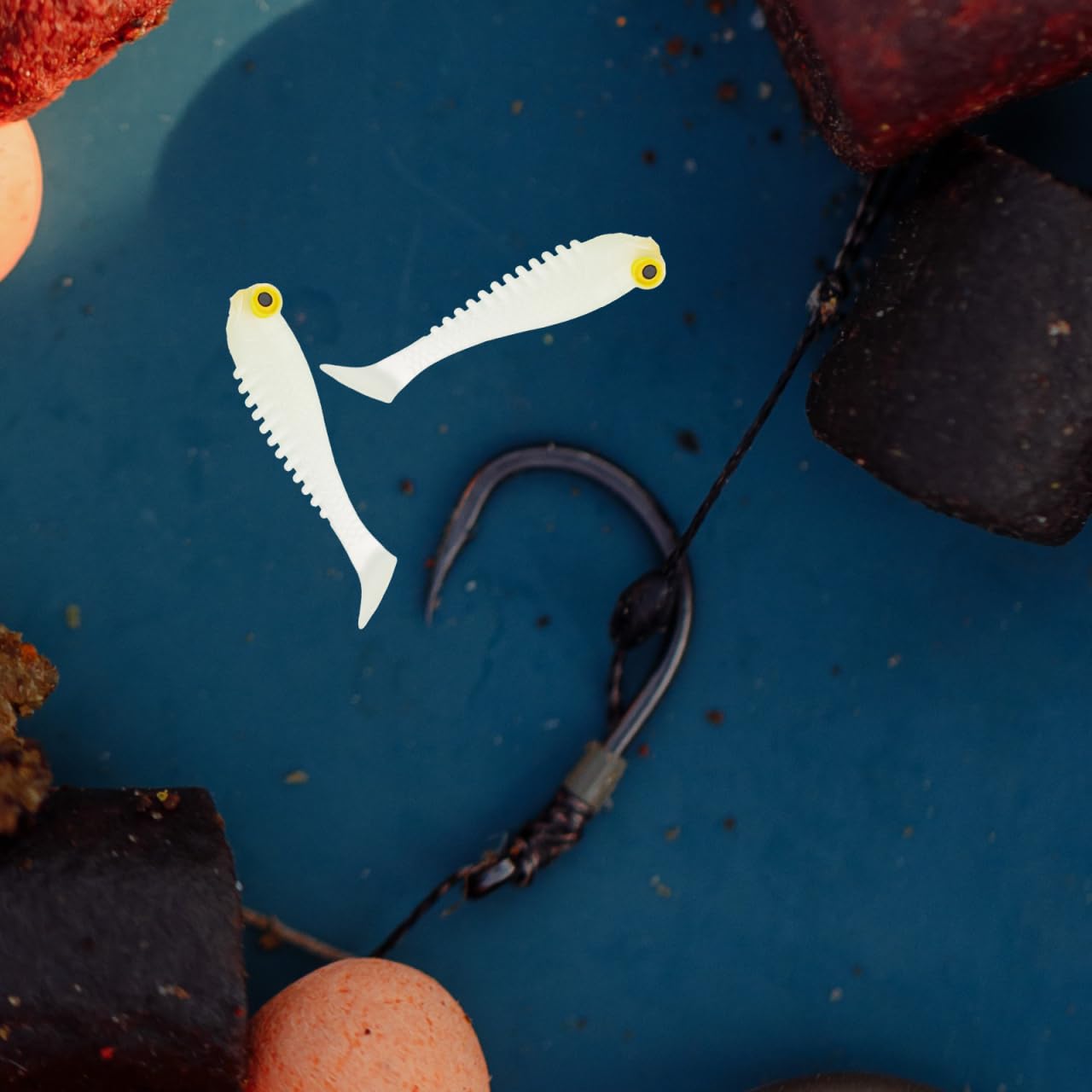 Anneome glow lures illuminate water for night bass catching.