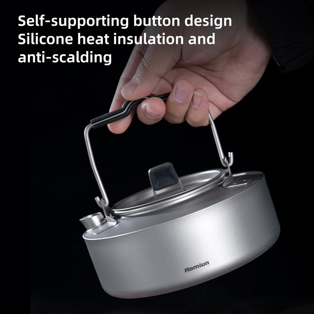 Induction-compatible titanium kettle for versatile stove setups.
