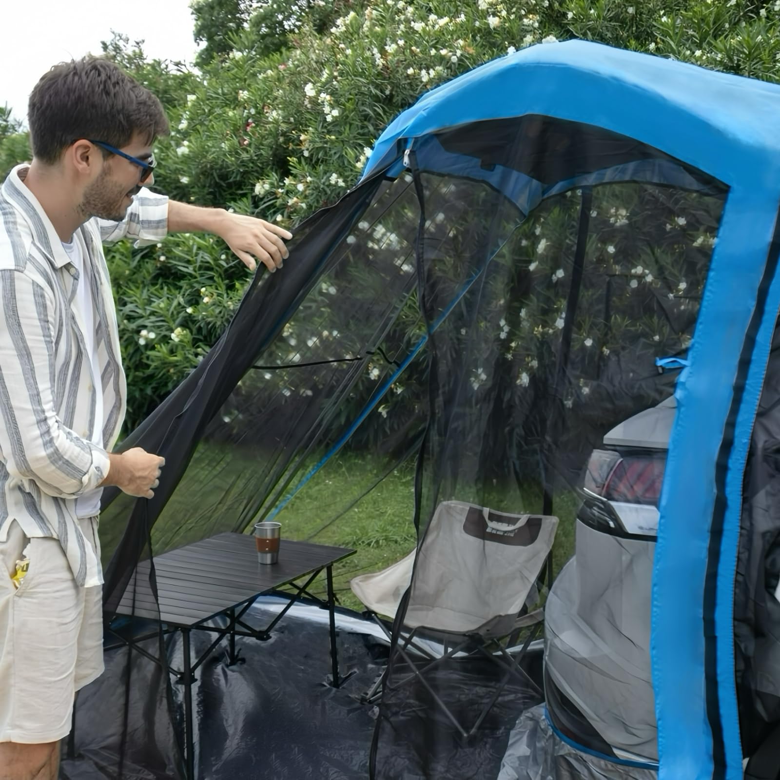 Aomxay SUV tent fit to car demonstrates universal compatibility, attaching securely to most SUVs.
