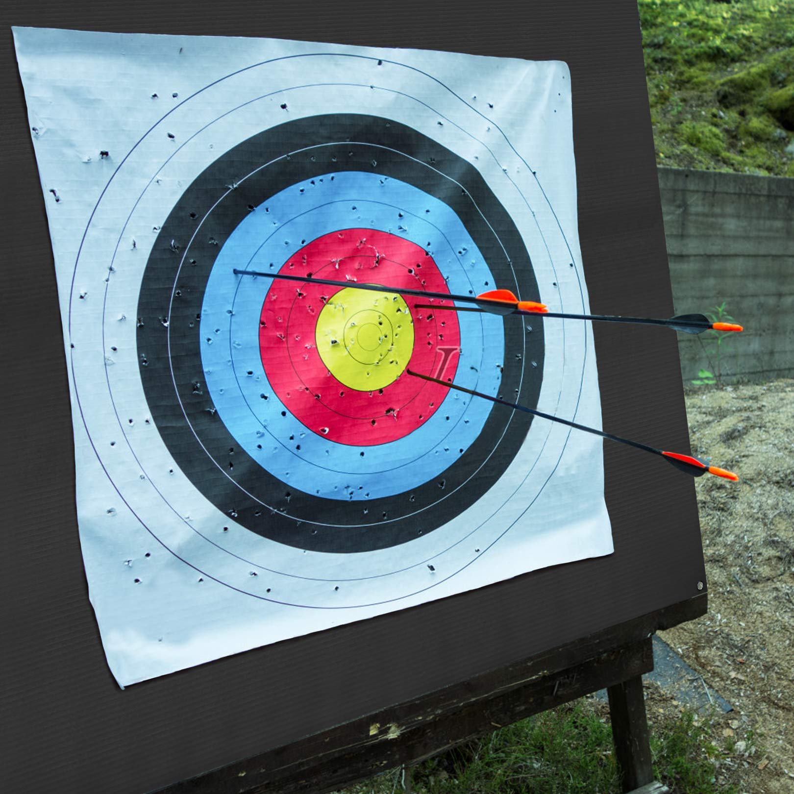 Aoneky 2mm black archery backstop in compact indoor setup.