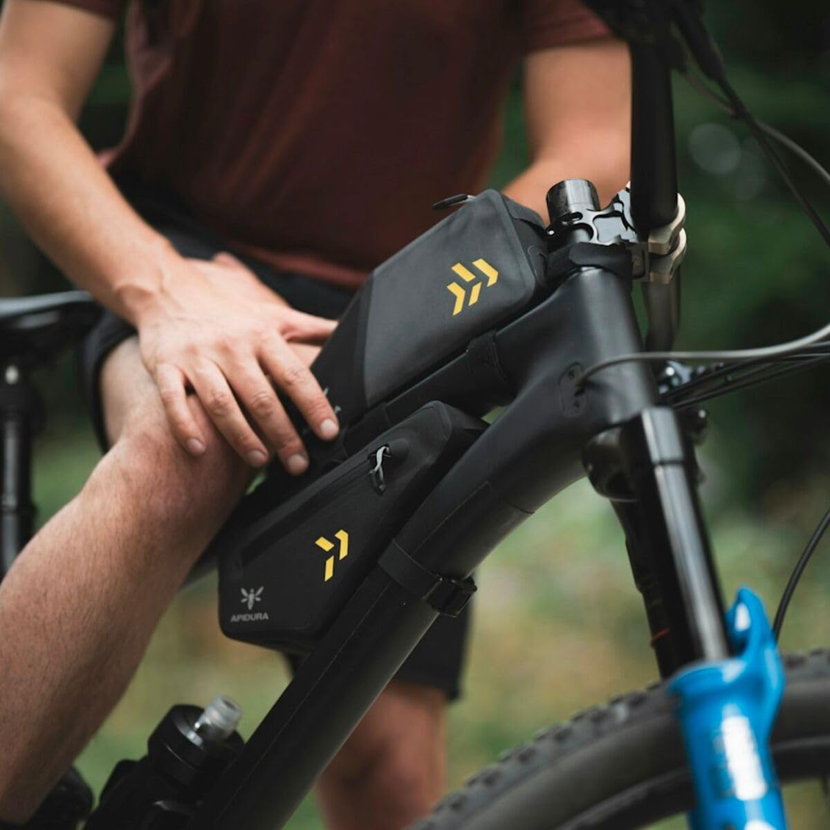 Apidura Pack reflective graphics boost visibility on low-light rides.