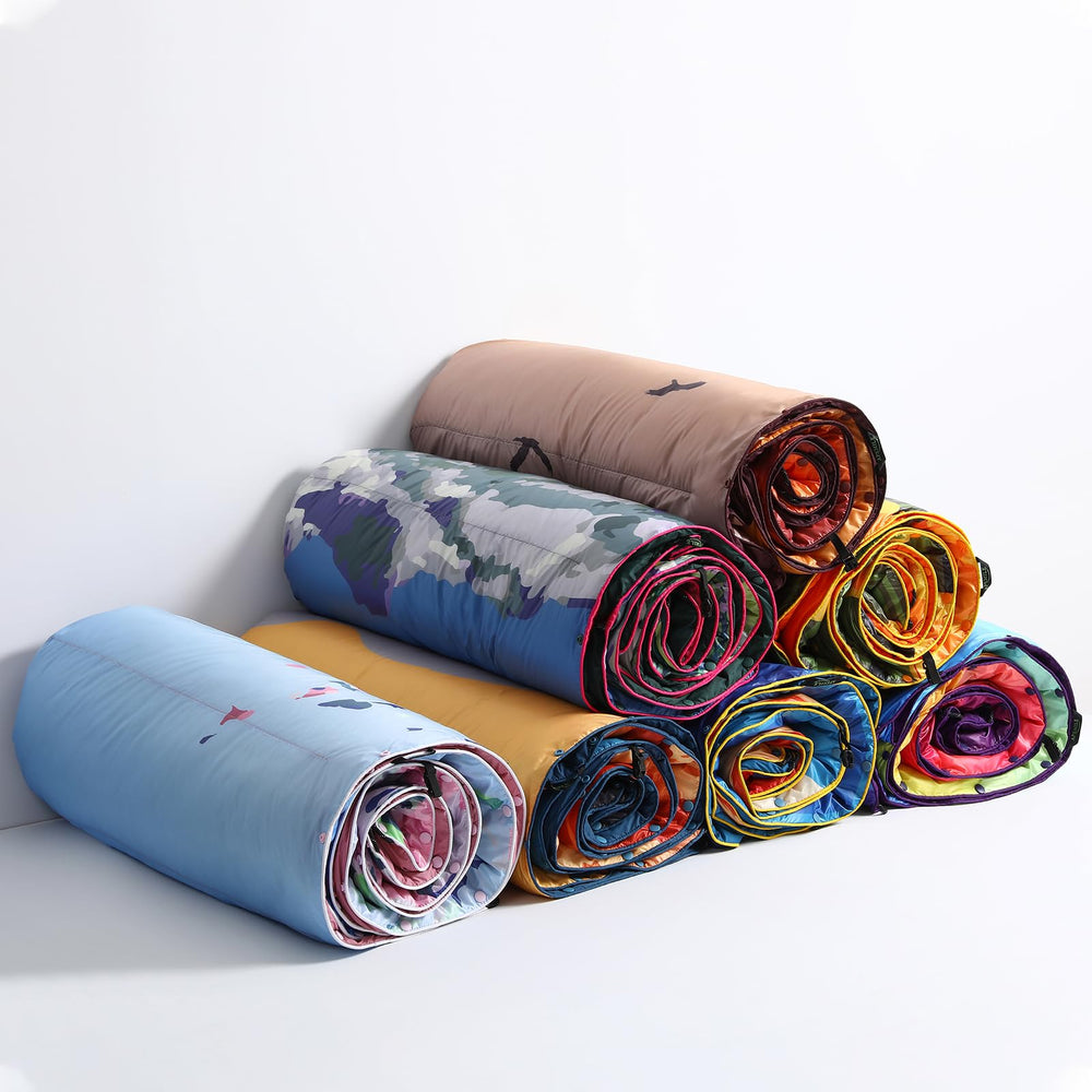 APSMILE outdoor down blanket on hiking trail demonstrates lightweight packability