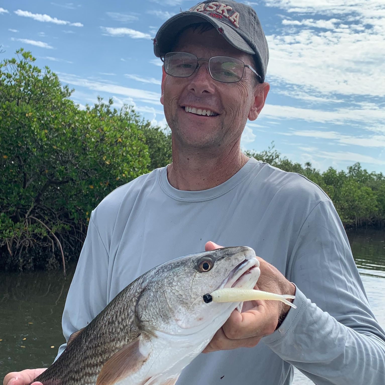 Aquatic Nutrition Q8 White Pearl close-up demonstrates bleeding bait technology in action