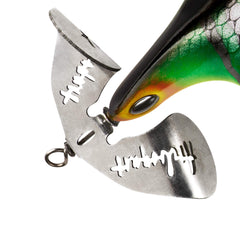 Arbogast Buzz Plug wobble during retrieve attracts bass near structure.