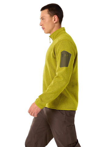 Arc'teryx Covert 1/2 Zip Neck olive moss fleece texture with wool-like look.