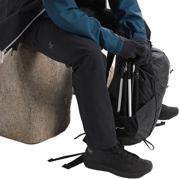 Arc'teryx Gamma AR Pant wearer in action showcases versatile outdoor use and comfort