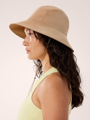 Arc'teryx Sinsola Shade Hat being worn during a hiking activity.