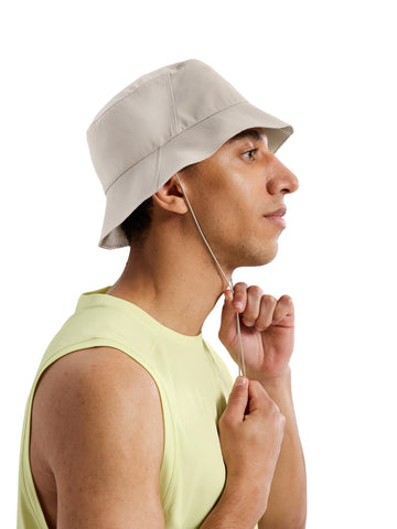Arc'teryx Sinsolo bucket hat redesign chin-strap closeup for windier hikes