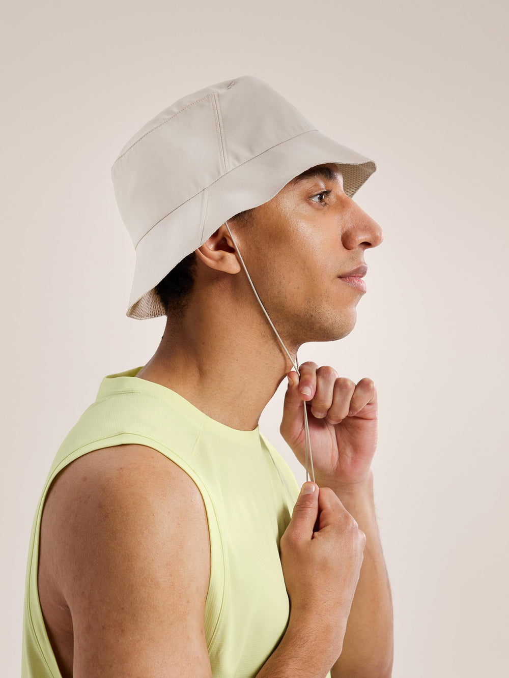 Arc'teryx Sinsolo bucket hat redesign packs compactly for travel and shade