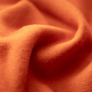 Arcturus Military Wool Blanket spread on camping setup for warmth.