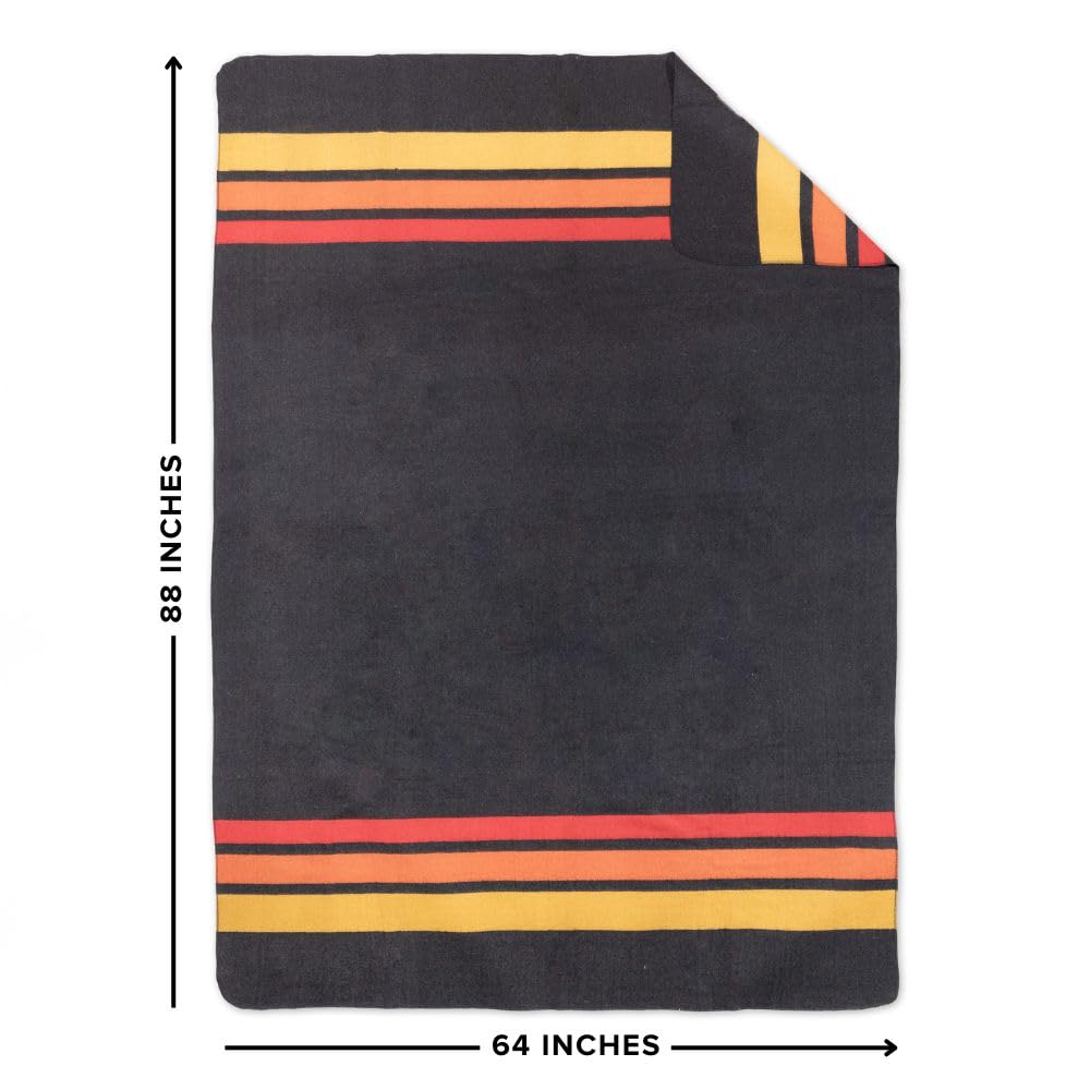 Arcturus Rainier blanket on queen bed demonstrates full coverage and coziness