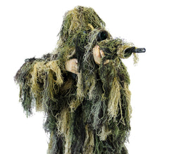 Arcturus Warrior ghillie suit jacket blends with vegetation in woodland terrain.