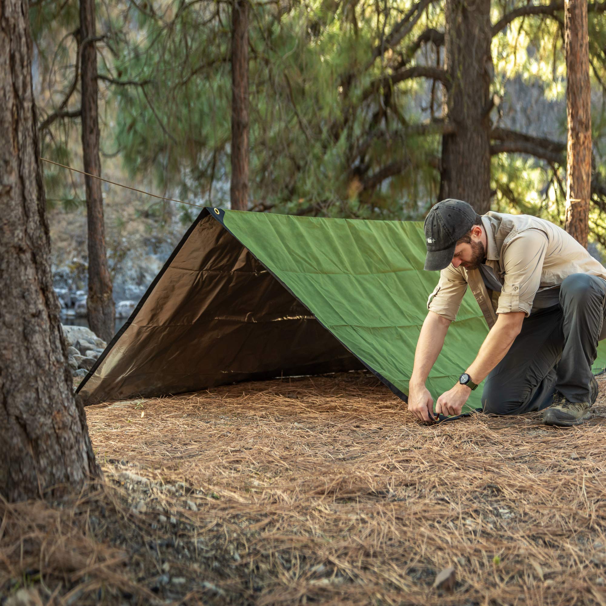Arcturus XL versatile camping use as tarp or blanket in outdoor scene