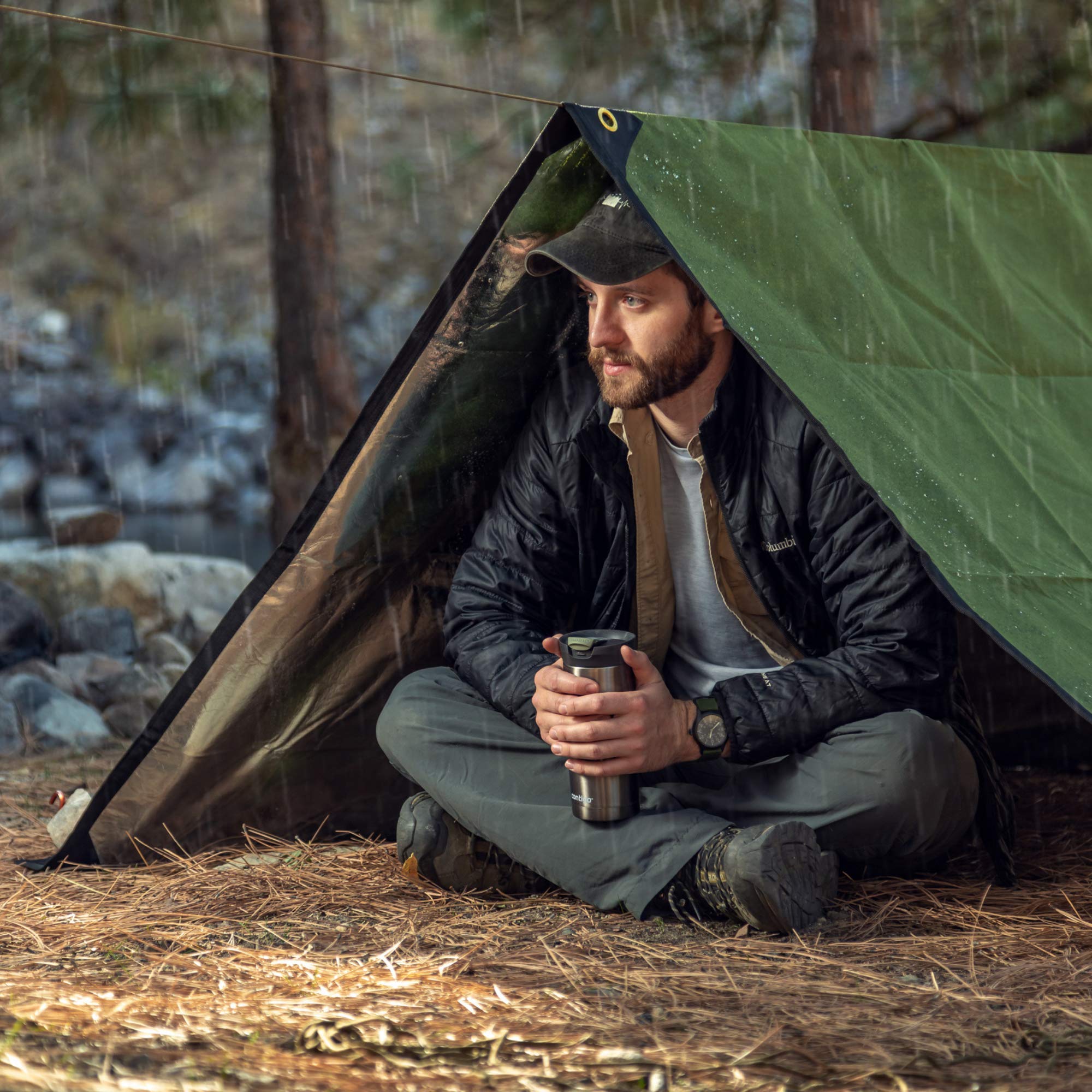 Arcturus XL rugged olive green tarp configured as ground shelter