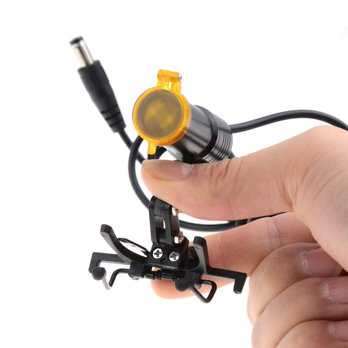 Aries Outlets compact headlamp clipped to a bag for portability