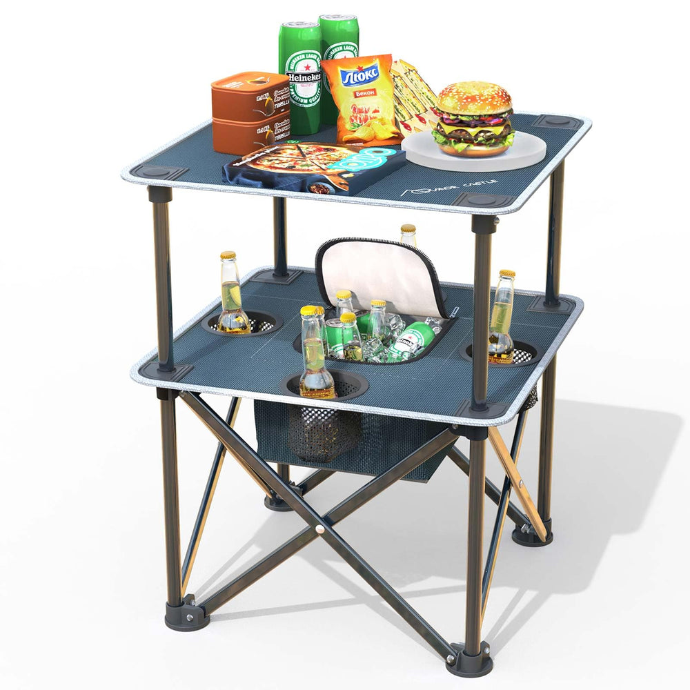 ARMOR CASTLE folding beach table on sand demonstrates quick setup for a seaside picnic.
