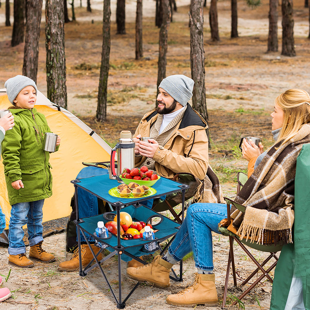 Armor Castle folding table side view in blue shows portable camping companion.
