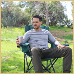 ARROWHEAD OUTDOOR chair showing cup holders and drinks within reach