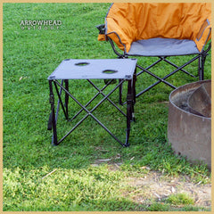 Arrowhead Outdoor folding table showing two cup holders for drinks