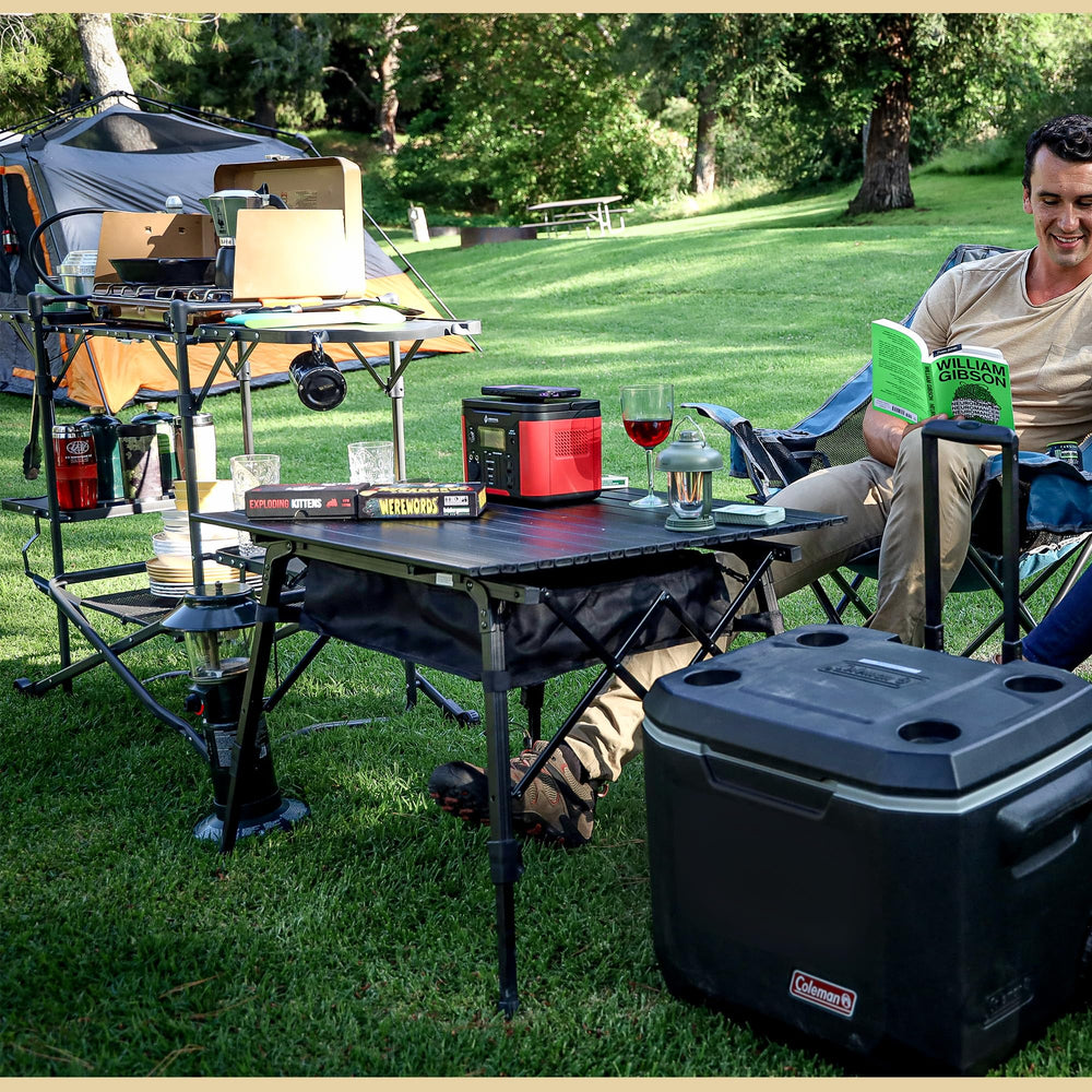 Arrowhead Outdoor folding table with under-table mesh storage for organized camp essentials