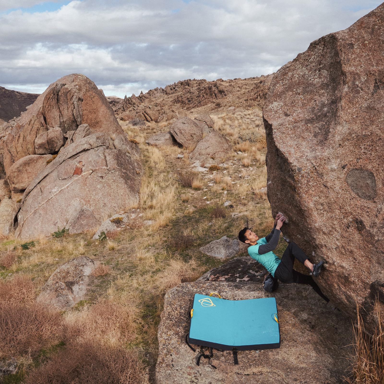 Asana Focus Crash Pad with Deluxe Suspension System and ergonomic straps in use.