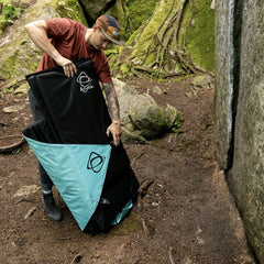 Asana VersaPad multi-purpose mat used as crag hangout and stretching surface