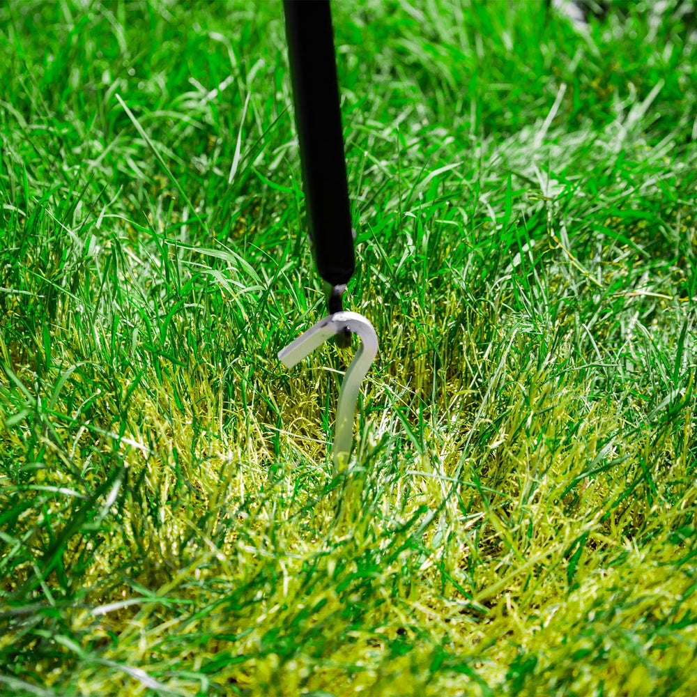 ASR Outdoor use shot shows stake removal at campsite.