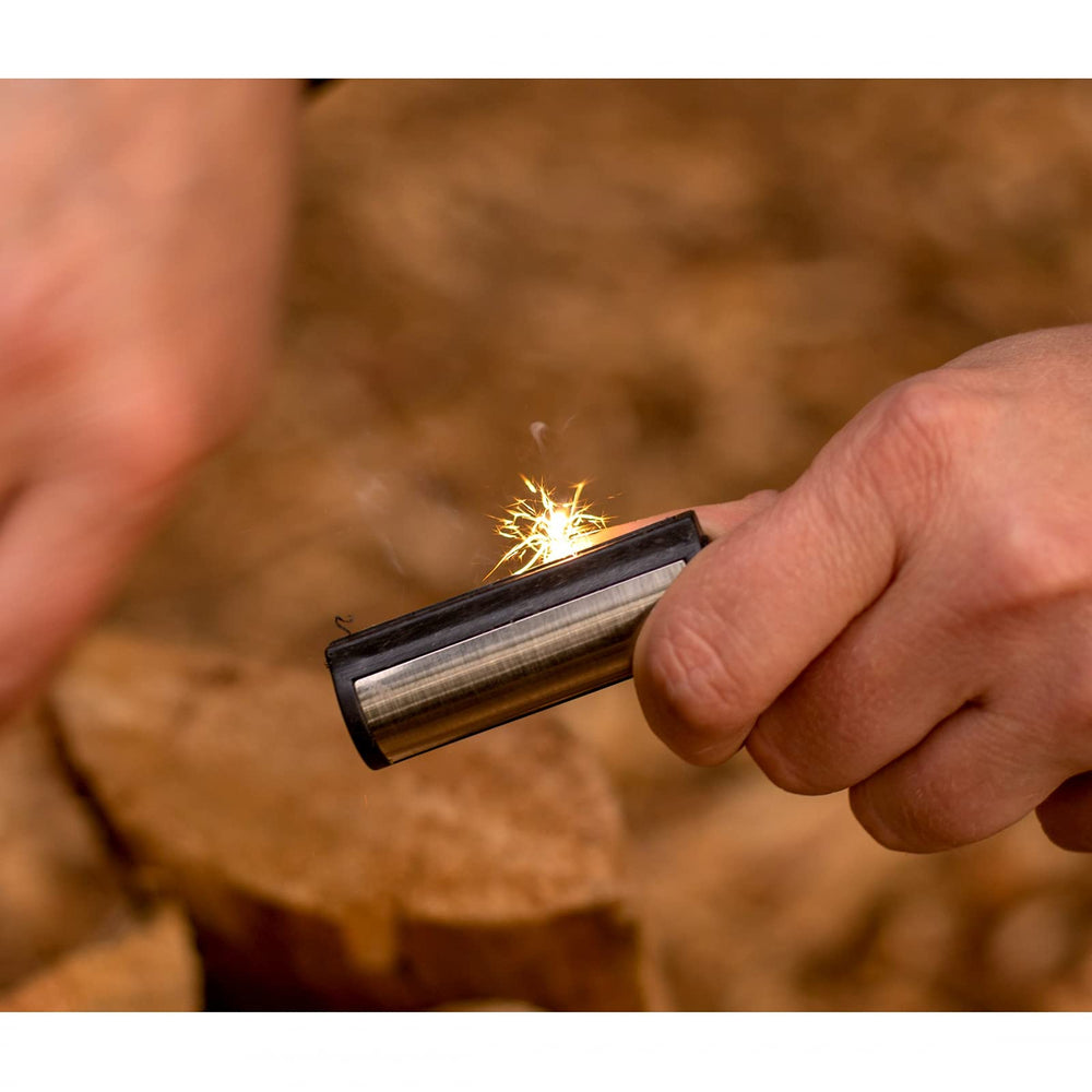 ASR Outdoor lightweight survival tool held in hand for easy carry