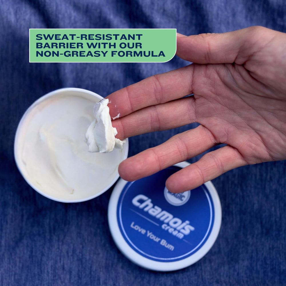 Dispense-action shot of ASS MAGIC Chamois Cream bottle