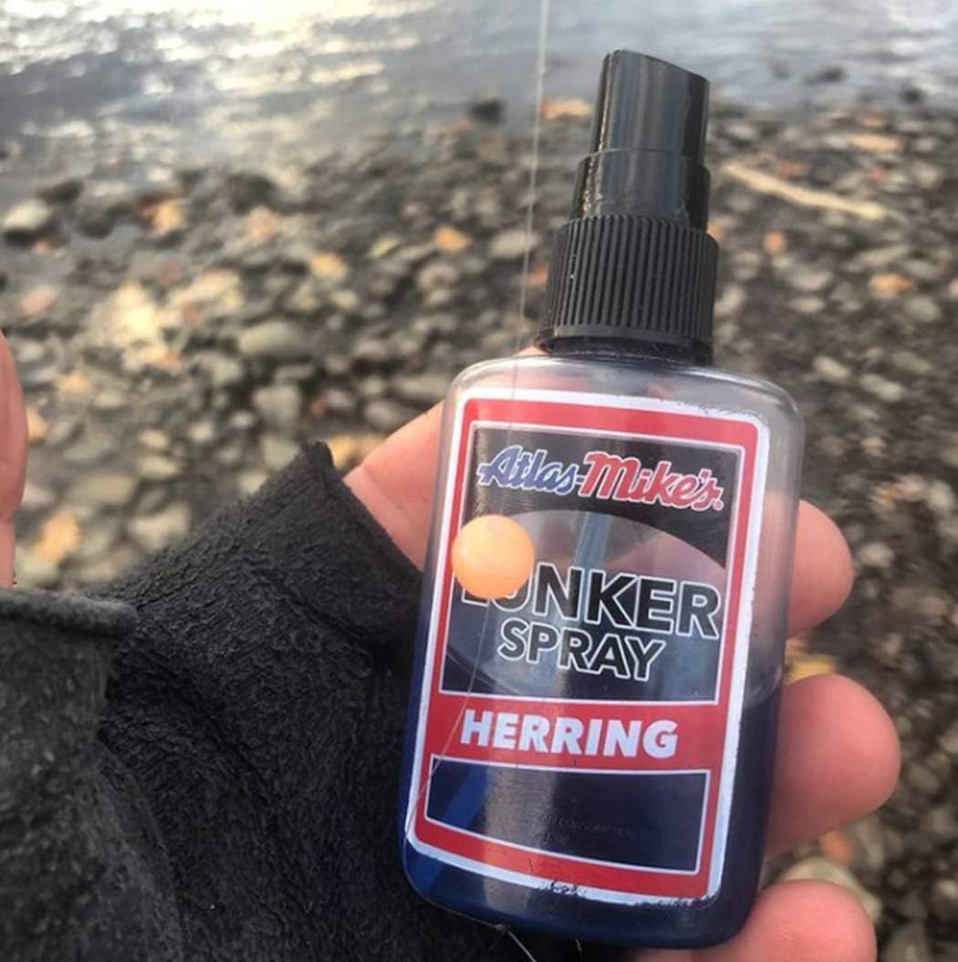 Close-up of Atlas-Mike's Lunker Spray bottles showing Herring and Shrimp scents