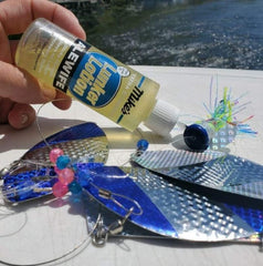 Atlas Mike's sticky-formula bottle application keeps lure coating longer and neater.