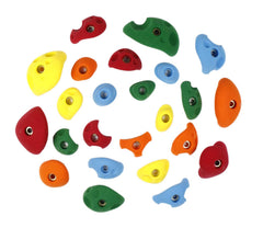 Atomik rock climbing holds in bright tones for kid friendly wall climbs