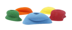 Atomik Climbing Holds small pinches set mounted on wall for finger strength variety.